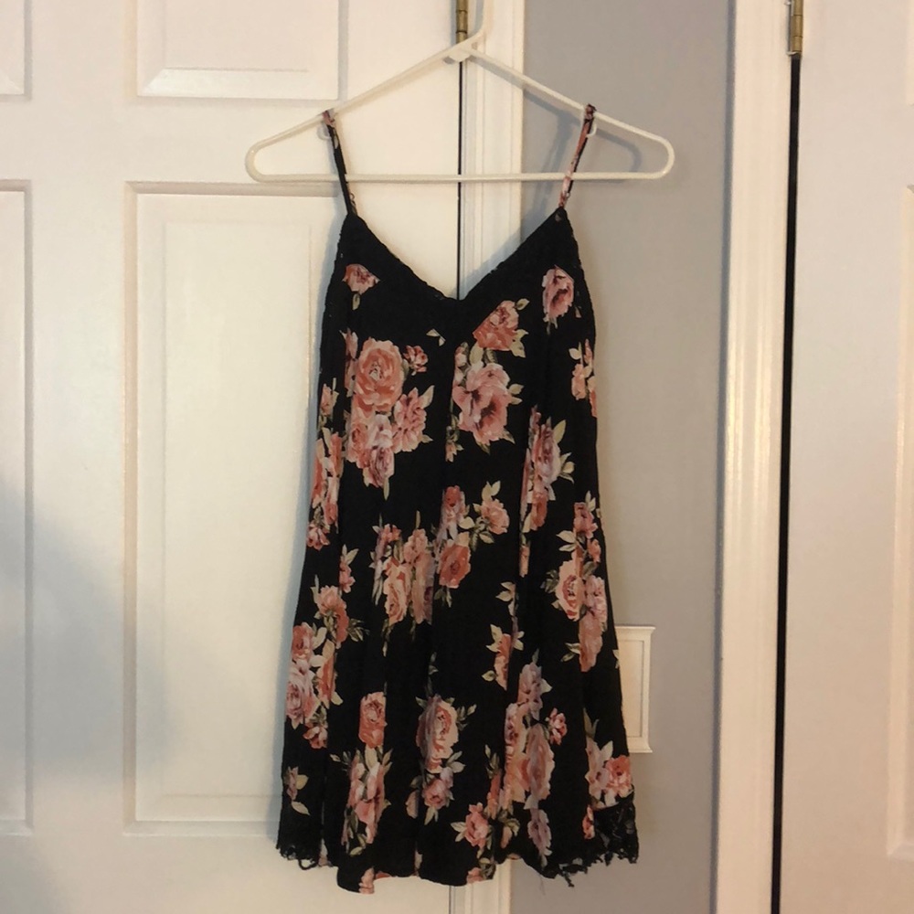 black mini dress with floral patterns and lace